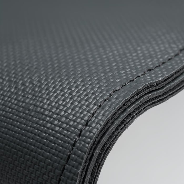 Close-up of 1500 GSM 1.2 mm VALMEX hull fabric showing hot-air welded seam construction.