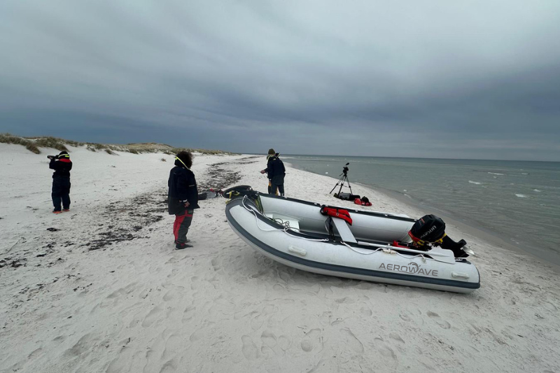 Aerowave Sprint 330 RIB rigged on beach with outboard