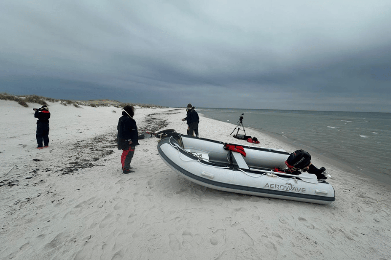 Aerowave Sprint 330 RIB rigged on beach with outboard