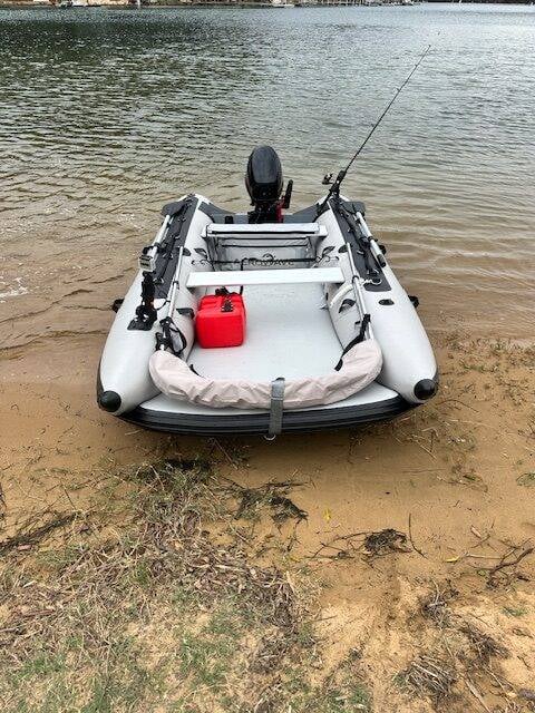 Aerowave Viper 330 inflatable catamaran rigged for fishing on an Australian riverbank