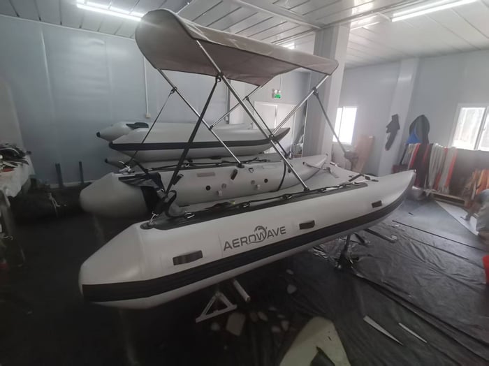 Aerowave Viper 330 inflatable catamaran in production with Bimini fitted, showing the grey hull and black rubbing strake — the type of vessel imported into the United States under HTS heading 8903