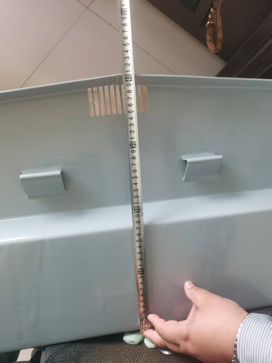 Aluminium transom drainage grill at the base of the transom — 405 mm transom height shown with tape measure