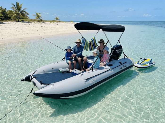 Family fishing on an Aerowave WaveRunner 380 inflatable catamaran built via the online configurator