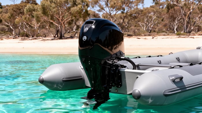Hidea outboard motor mounted on an inflatable catamaran in clear Australian waters