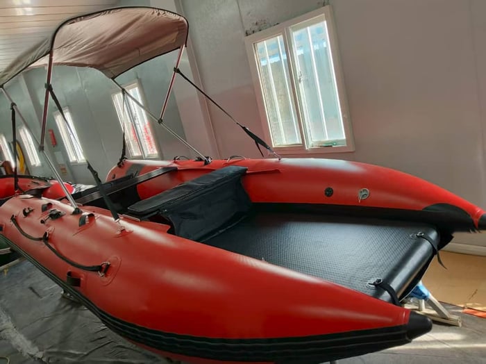 Aerowave WaveRunner 380 inflatable catamaran with Hidea outboard running in open water