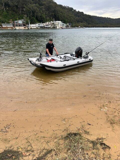 Aerowave AeroCat 330 lightweight inflatable catamaran on the water