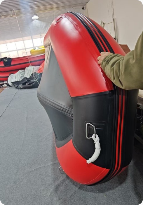 Underside of an Aerowave inflatable hull showing heavy VALMEX fabric and hull shape