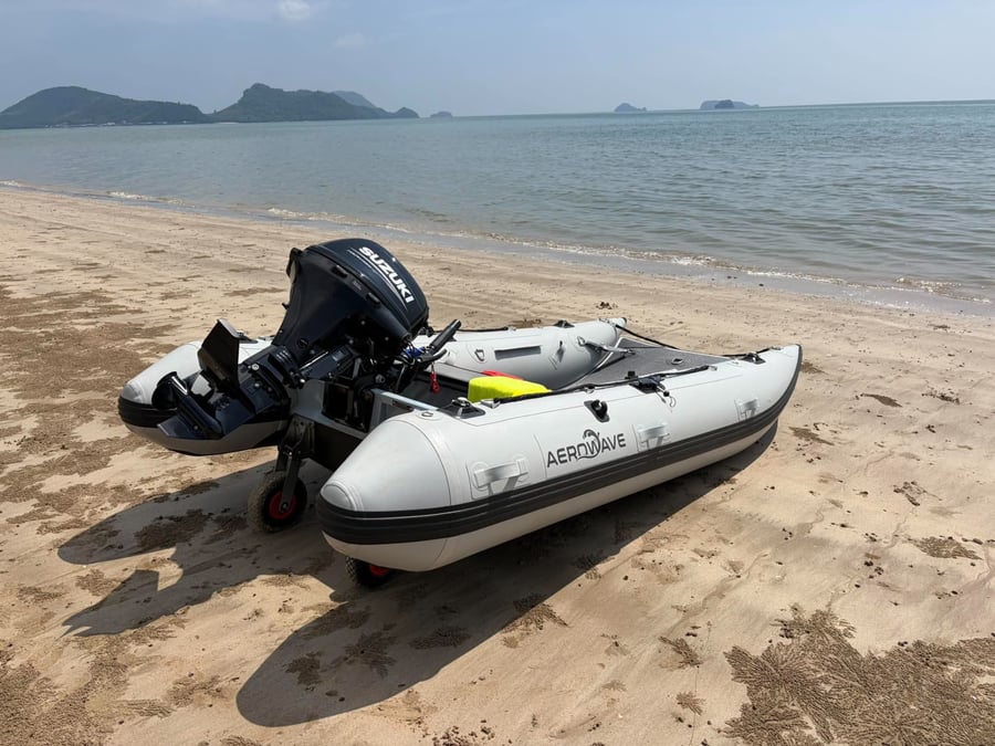 Owner's Aerowave Viper 330 with Suzuki outboard beached in Thailand